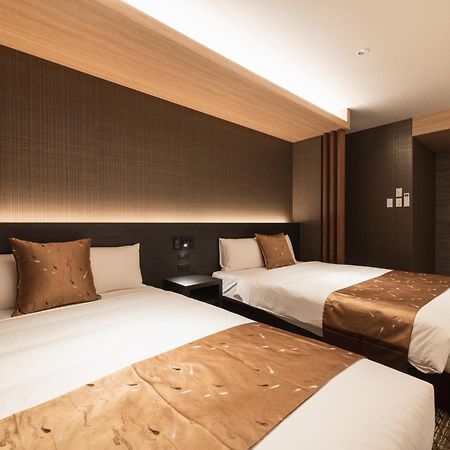 Grand Base Kagoshima Aparthotel Bagian luar foto