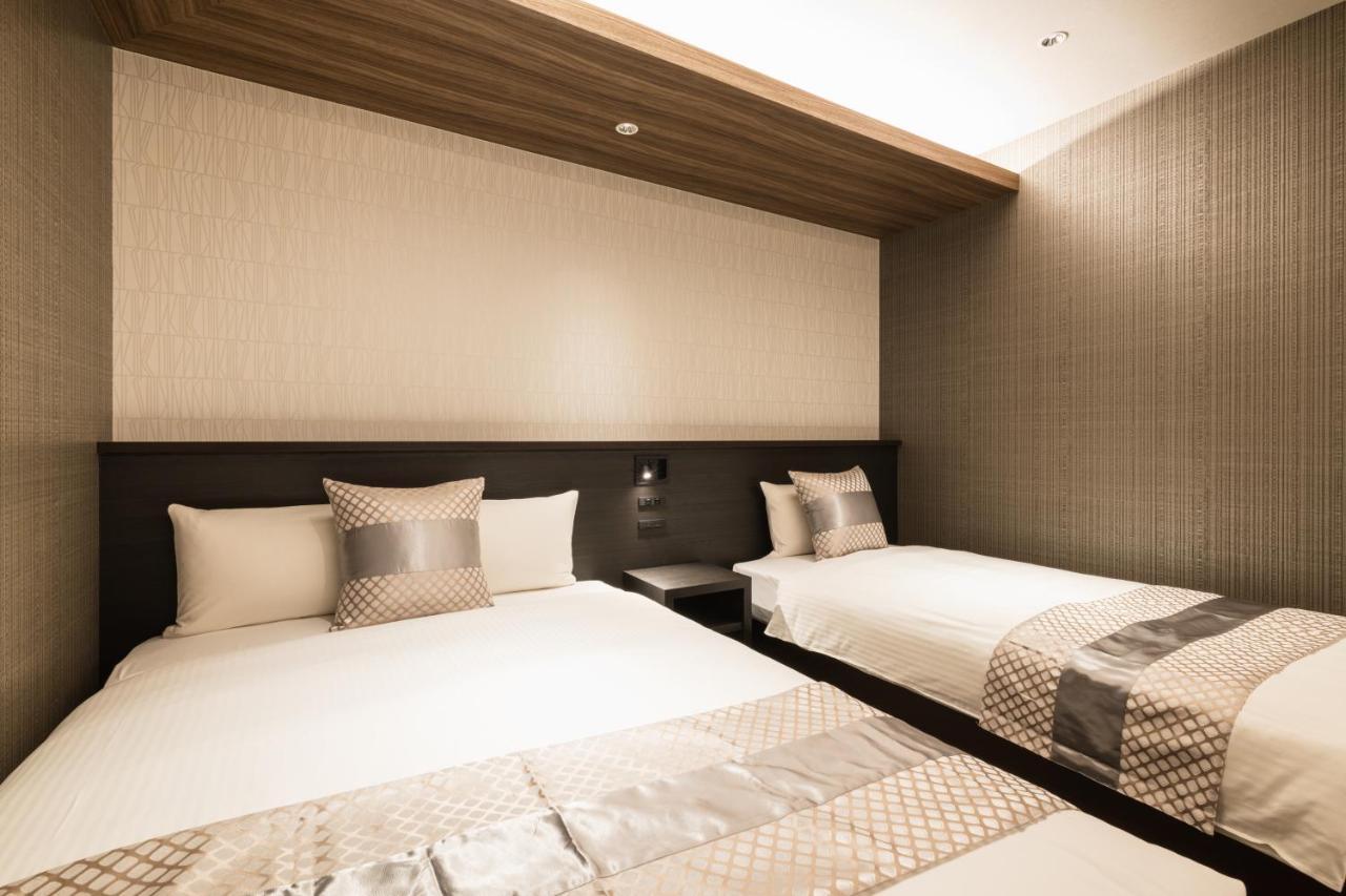 Grand Base Kagoshima Aparthotel Bagian luar foto