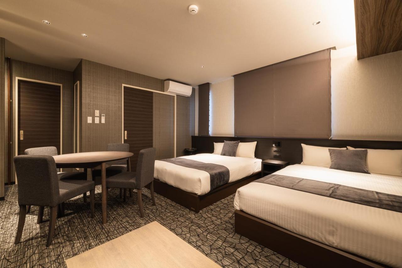 Grand Base Kagoshima Aparthotel Bagian luar foto
