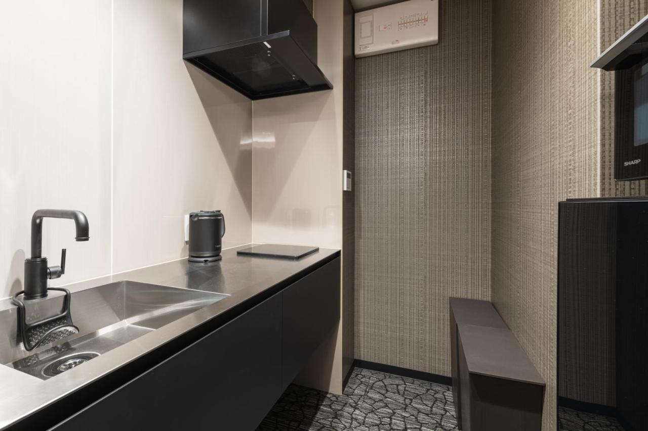Grand Base Kagoshima Aparthotel Bagian luar foto