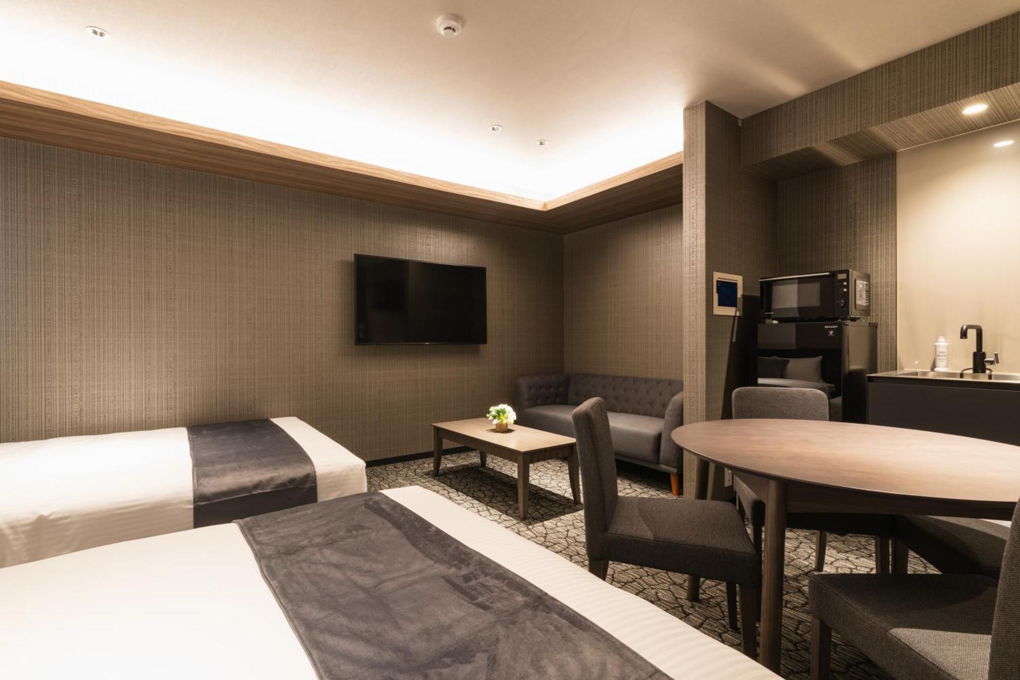 Grand Base Kagoshima Aparthotel Bagian luar foto