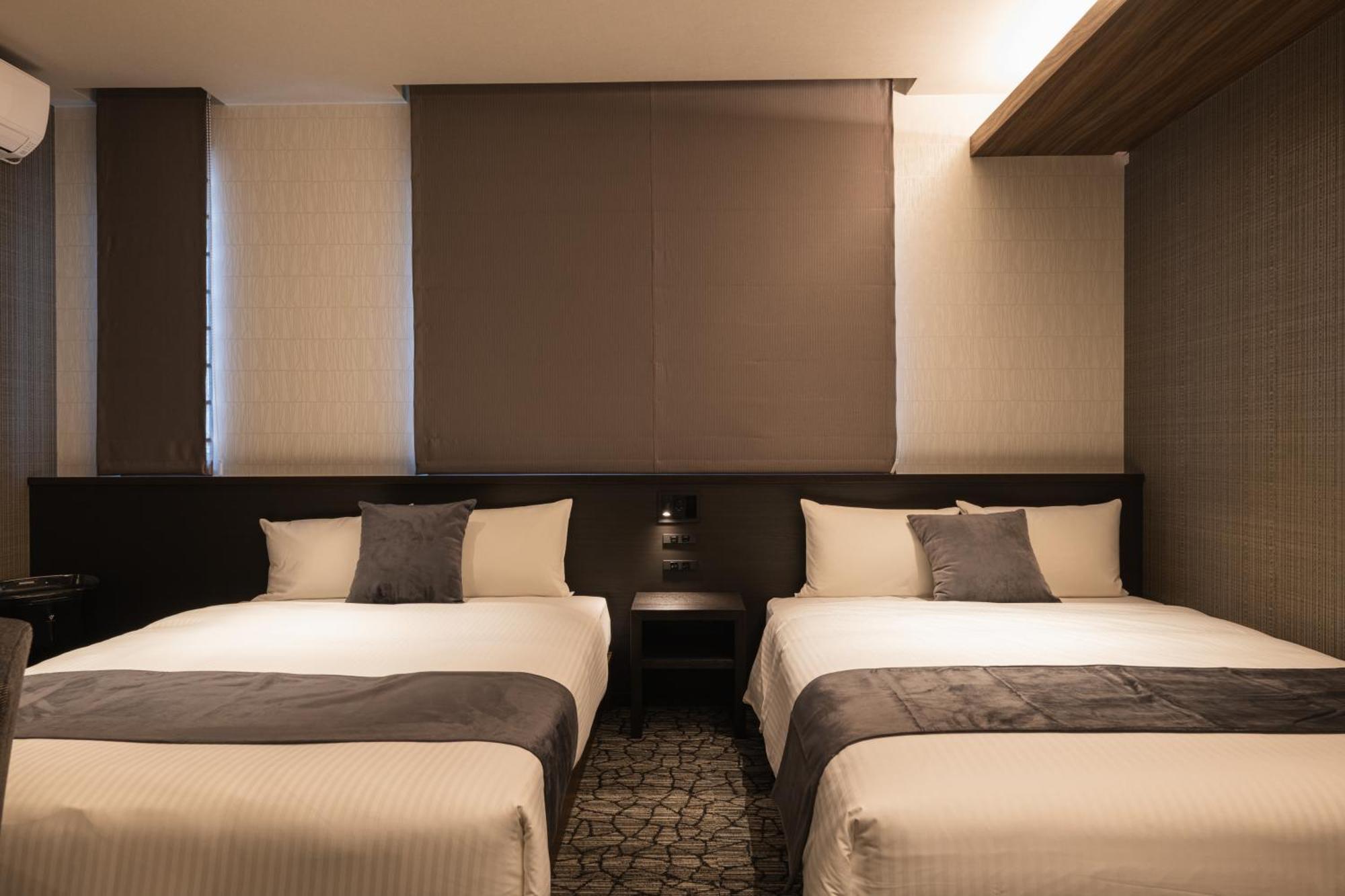 Grand Base Kagoshima Aparthotel Bagian luar foto